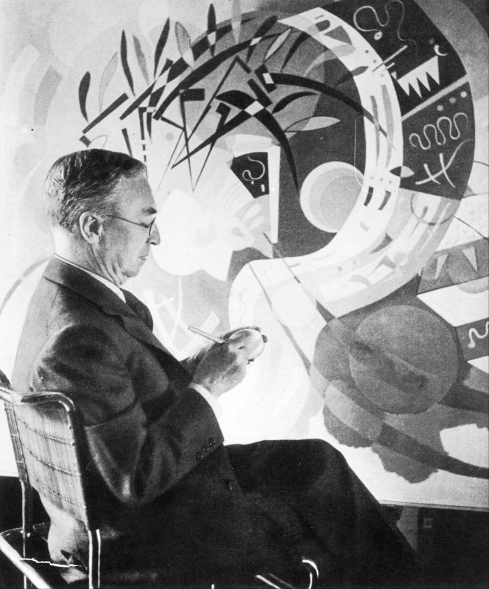 Wassily Kandinsky at work in his studio, around 1936