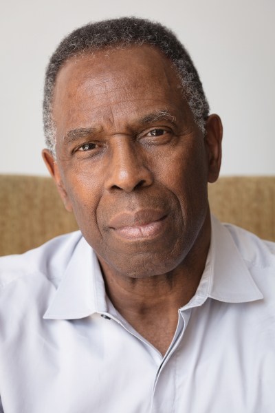 Portrait of Charles Gaines, who is wearing a white collared shirt.
