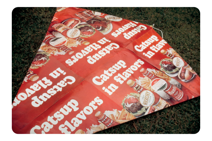 A red fast-food wrapper with the words ‘Catsup in flavours’