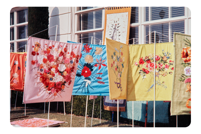 Colourful hand-sewn floral banners 