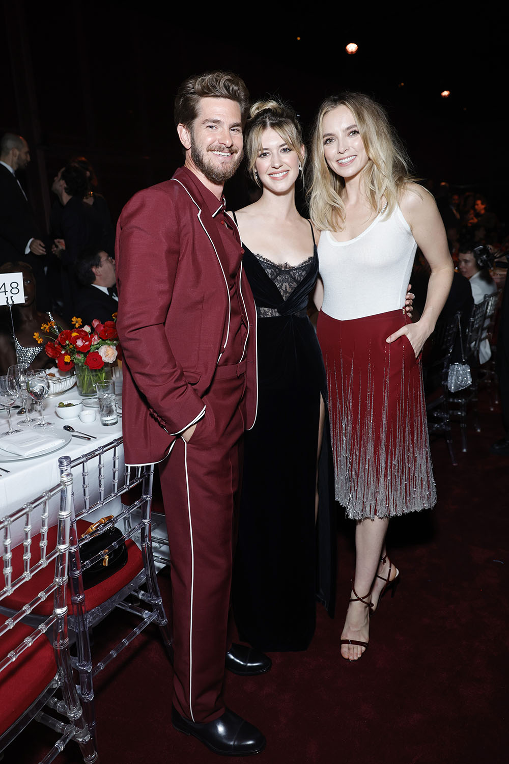 (L-R) Andrew Garfield, wearing Gucci, Daisy Edgar-Jones, wearing Gucci, and Jodie Comer, wearing Gucc