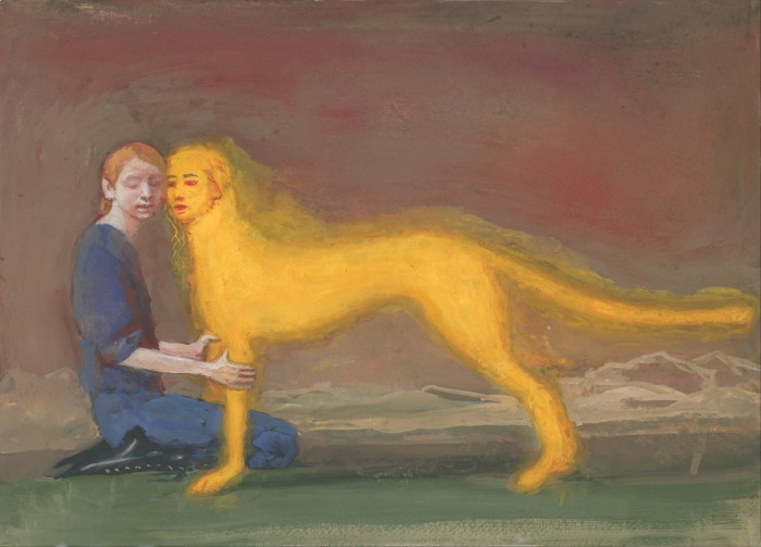 A woman sits on the floor touching the legs of a yellow dog with a human head