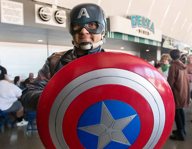 Danny Pinto with Wide Horizons dressed as Captain America at the annual StocktonCon at the Stockton Arena in downtown Stockton on Saturday, August, 13, 2022.