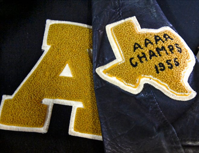 A letterman jacket originally worn by Gerald Galbraith is on display during Thursday’s ground breaking at Abilene Heritage Square. The former Lincoln Middle School was originally Abilene High, the jacket marks the state football championship won in 1955.