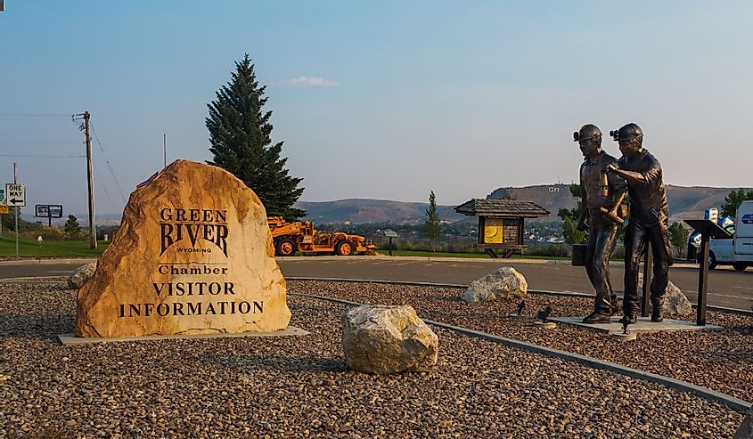 Statue of two miners and Visitor Center sign, Green River, Wyoming.