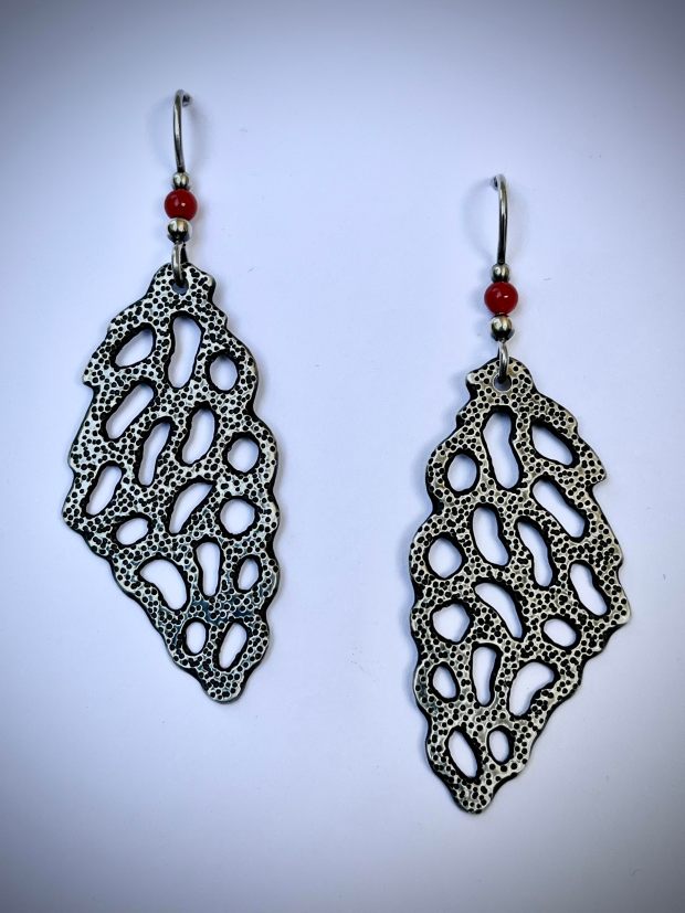 Pictured are a pair of Kris Patzlaff's earrings made from sterling silver and coral. (Submitted)