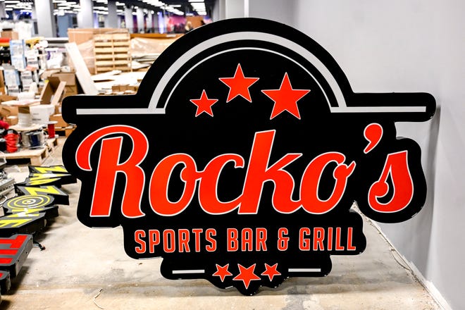 The sign for at Zap Zone XL's restaurant Rocko's Sports Bar and Grill waits for installation on Wednesday, Nov. 8, 2023, at the Lansing Mall.