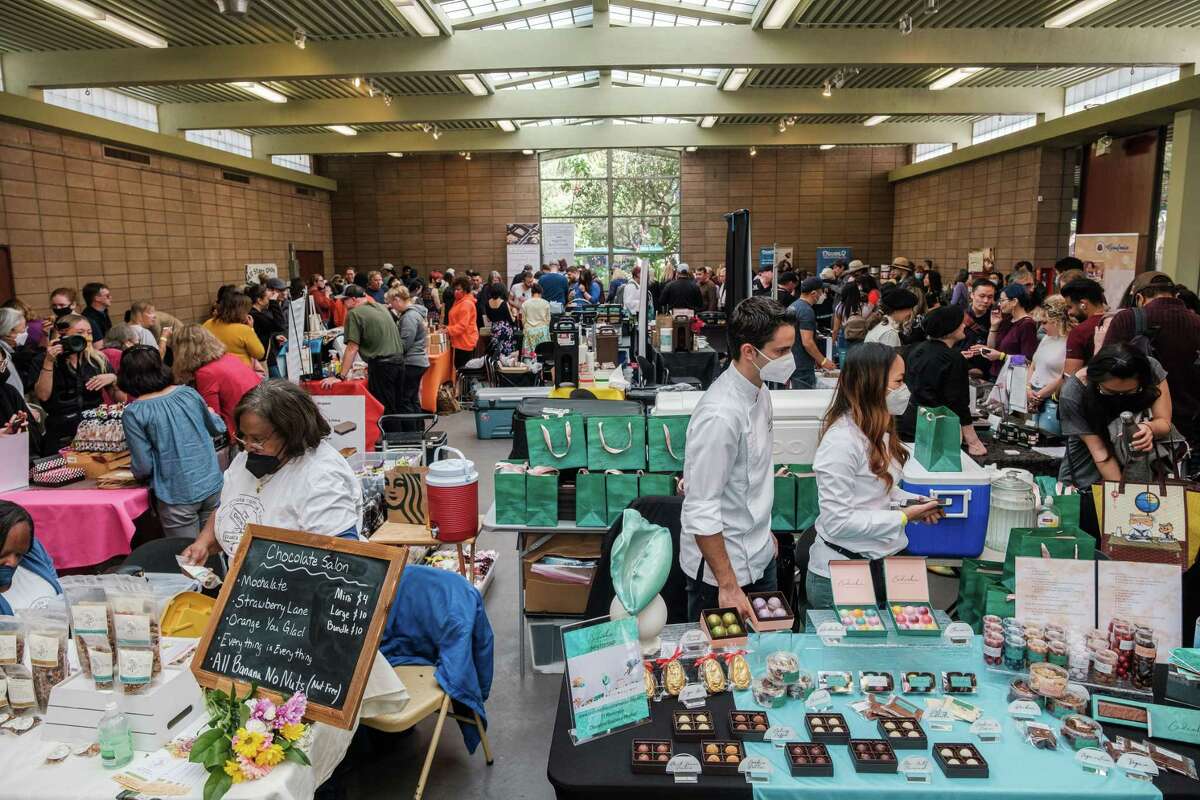 People enjoy the chocolate salon at the San Francisco County Fair Building in San Francisco in 2022.