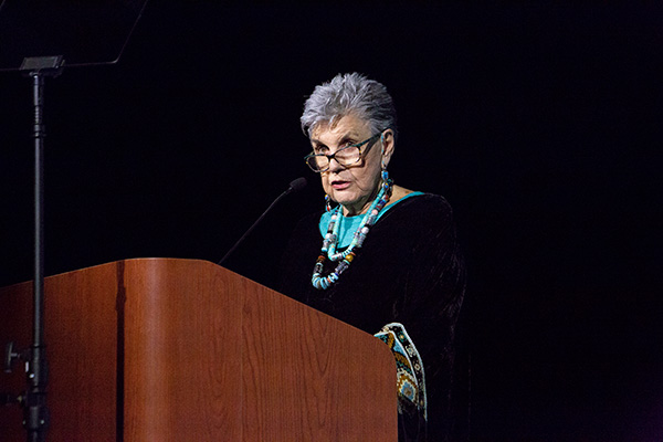 Marilyn Melton speaks at a podium.