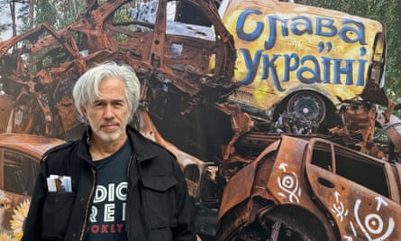 Phil Buehler next to his Little Ukraine installation