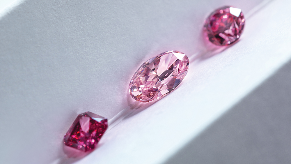 From left: fancy-red, fancy-purplish-pink, and fancy-intense-pink Argyle diamonds