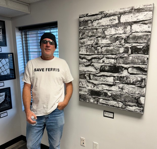 Since having his own black and white photography studio at Stella's Art Gallery for a year, Joseph John has had opportunities in the art world he would have never had on his own. (Marah Morrison -- The News-Herald)