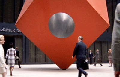Still from the movie April Fools (1969) showing Isamu Noguchi’s sculpture Red Cube (1968) on the plaza of the Marine Midland Bank building