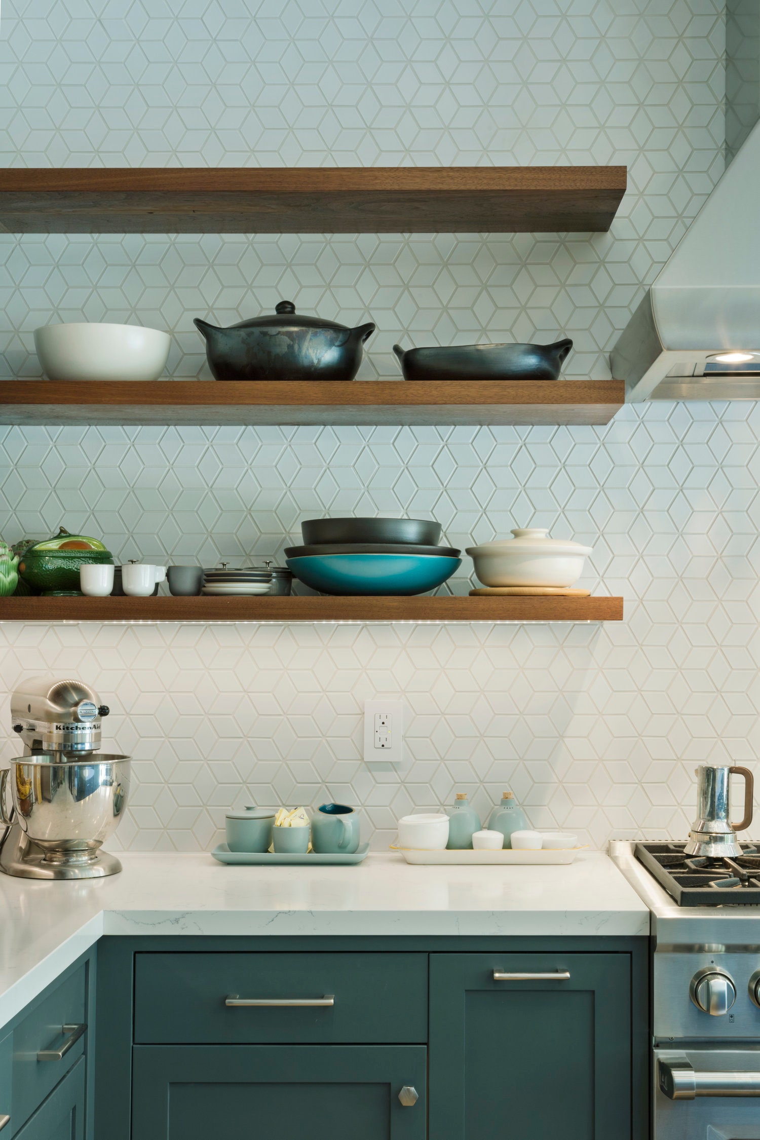 For a home in San Francisco Lydia Lyons Designs installed a Fireclay Tile backsplash and added open shelving to display...