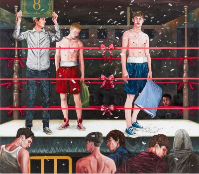 Two partially nude male boxers inside a boxing pen lined with tied bows. People look on in the audience.