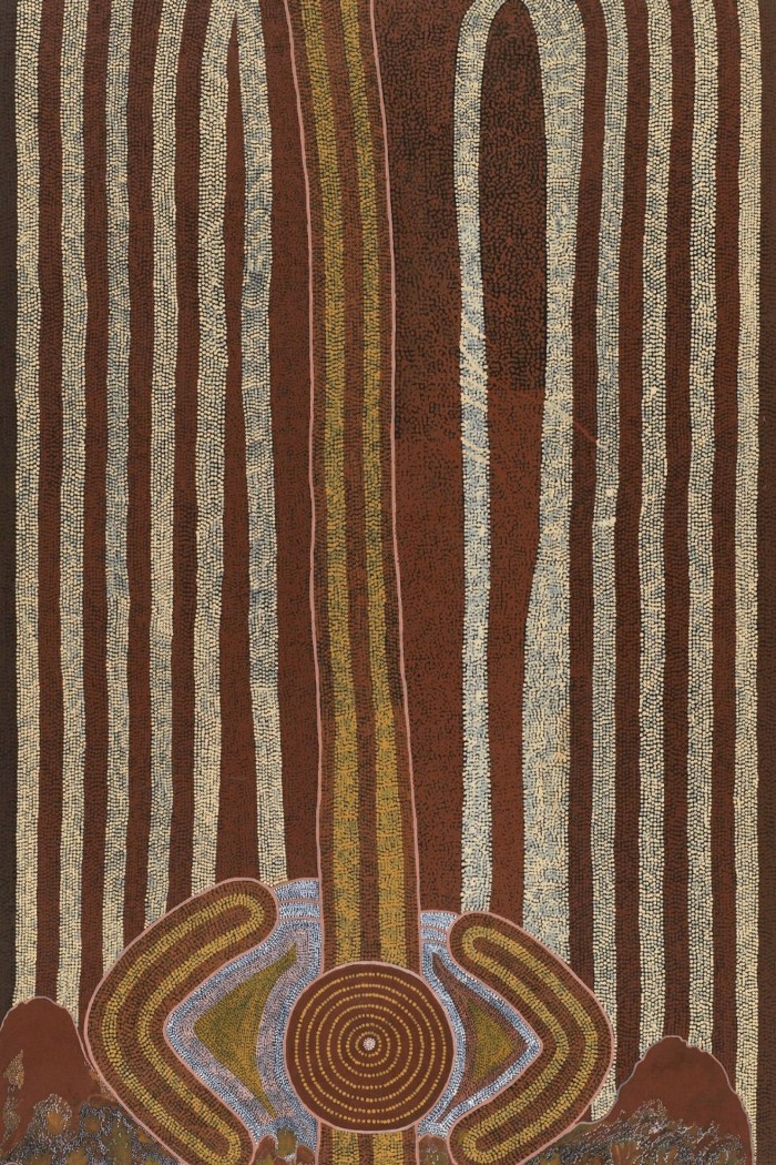 A painting of thin brown and yellow vertical stripes composed of many tiny dots