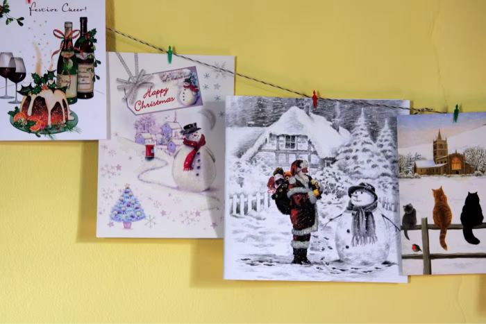 Christmas cards hanging on a string 