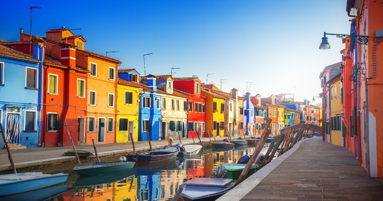 Colorful houses in Burano, Venice, Italy, lined along the canal