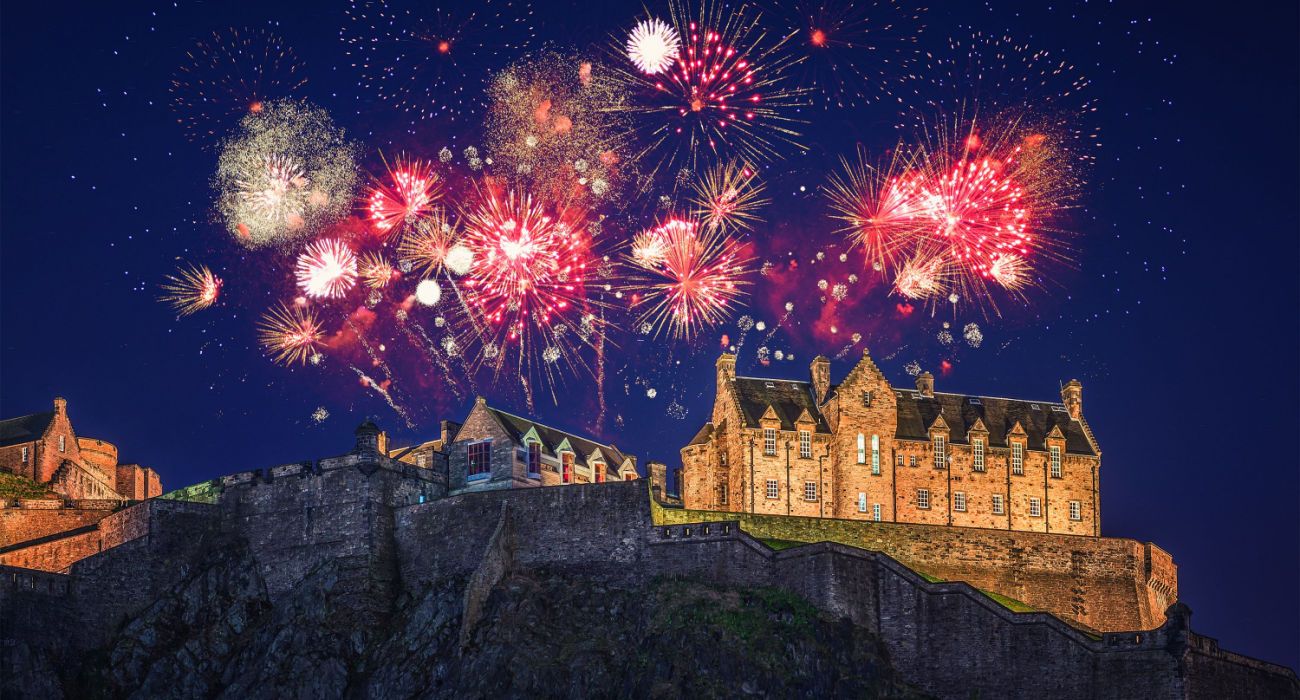 The castle of Edinburgh with fireworks during Hogmanay