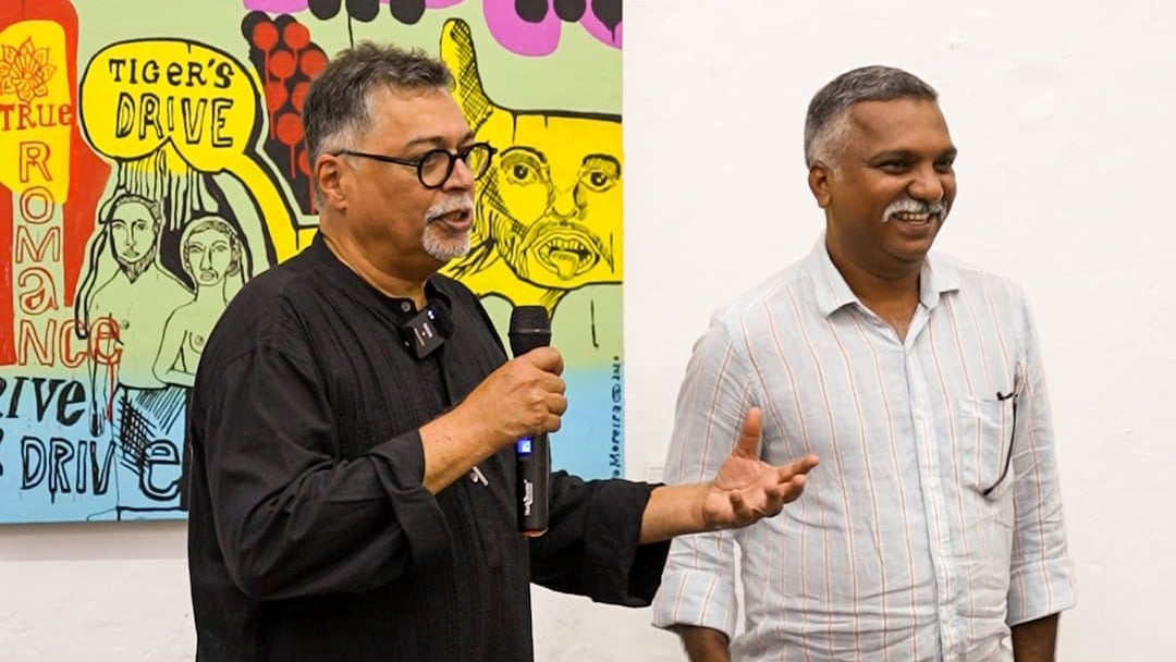 The exhibition is curated by (standing left) Subodh Kerkar, founding director of MOG, and artist Pradeep Naik. 