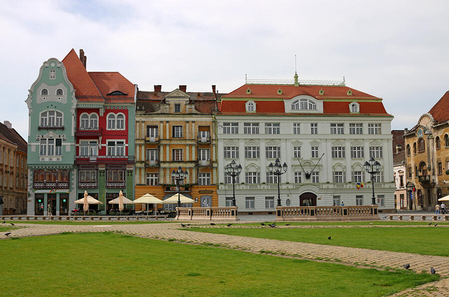 Town square with colourful buildings.