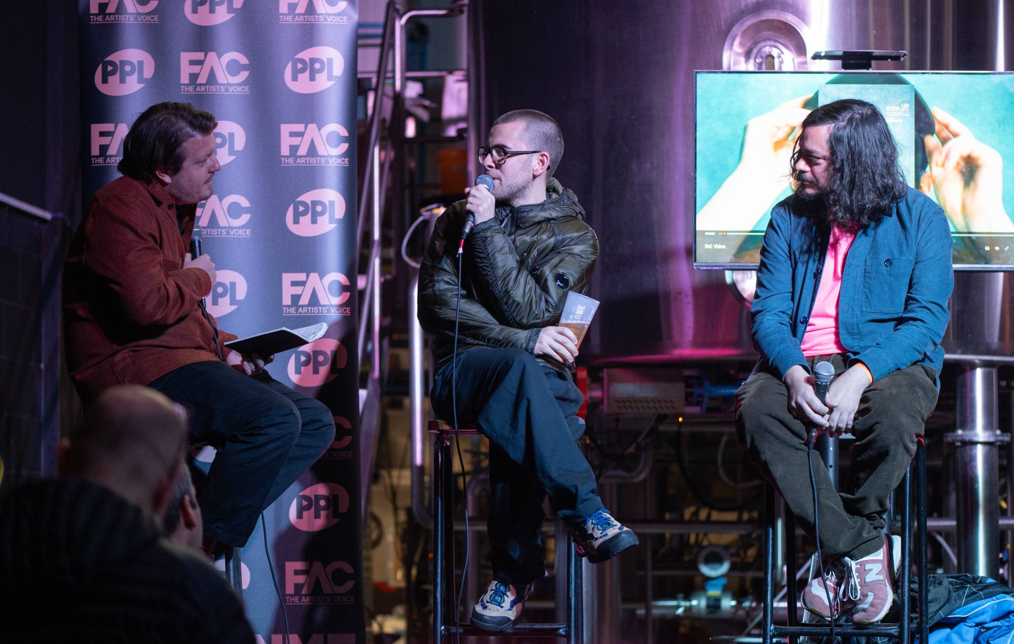 NME's Andrew Trendell interviews Murray Matravers of the band FKA Easy Life and Sam Duckworth of Get Cape. Wear Cape. Fly at the 2023 FAC AGM. Credit: Jeremy Strong