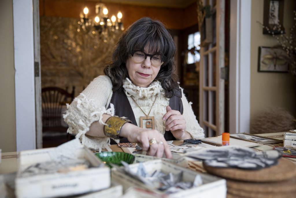 Donna Castellanos, an artist who refers to herself as a “rescuer of once-loved things,” prepares collages for an event at the National Portrait Gallery using recycled paper materials on Jan. 26, 2024, at her home in Elmhurst.