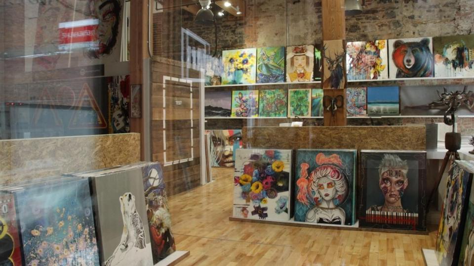 Le HangArt Saint-Denis is temporarily closed, one of the owners says. But the artists want their art back. (CBC - image credit)