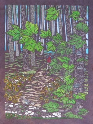 Lorraine Bubar, an artist who stayed at the Porcupine Mountains State Park in August 2023, created a piece inspired by her residence in the state park. The piece was created by layering colored papers and was hand cut from handmade paper from Japan, Nepal and Thailand.