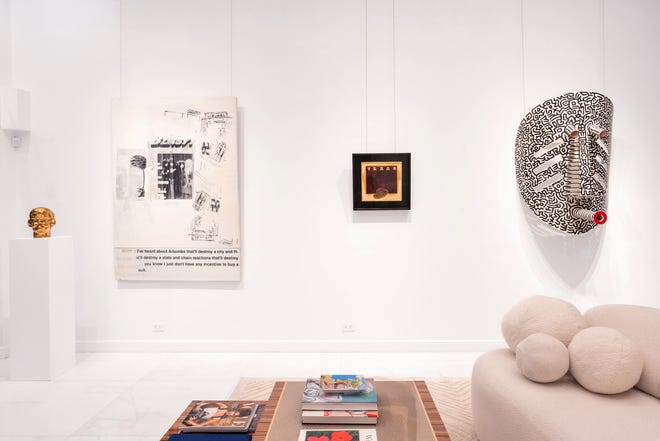 The "Sans Titre" art exhibition at Wynn Fine Art includes (from left) “The Altar Boy” by George Condo, "Two Pants Suit" from Richard Prince, "Texas" from Ed Ruscha, and "Untitled" (Mask with Long Mouth) from Keith Haring.