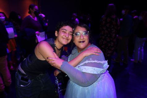 Co-director Shan Hafez (left) embraces dancer Vanessa Hernández Cruz (right) in a heartfelt hug following the showcase.