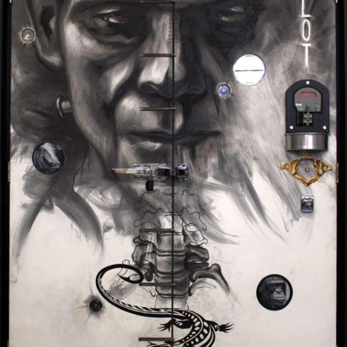 "He" is oil, charcoal and graphite with found objects on aluminum panels. (Gary Chapman)