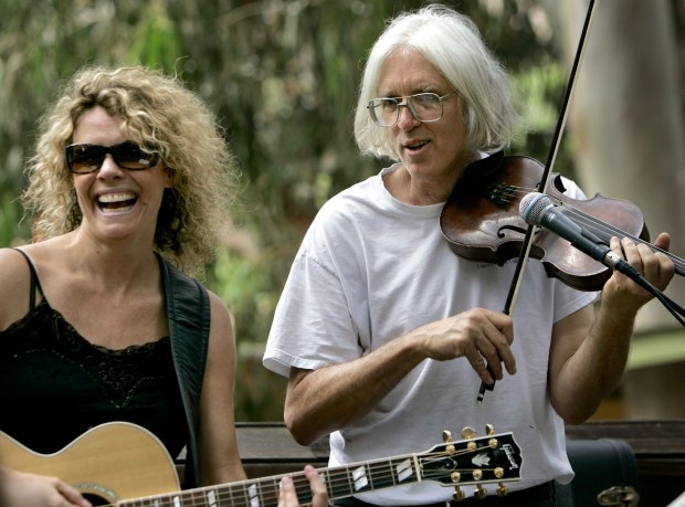 Artist Douglas Miller joins the stage at the Laguna Beach Sawdust Festival. (File photo by Mindy Schauer, The Orange County Register )
