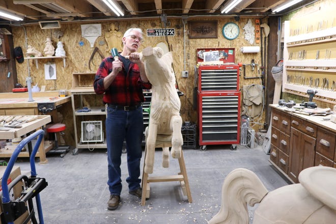 Raised in Caledonia, Goings opened Carousels and Carvings in Marion in the 1990s, working now for 35 years to revive and sustain the art of carved wooden carousels.