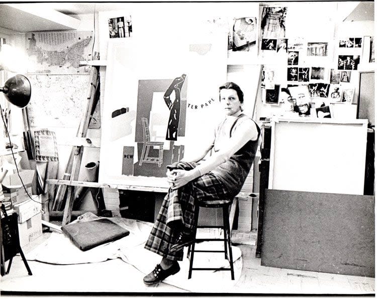 Erica Rutherford in her studio around 1970. A map of Prince Edward Island is posted on the left upper corner of the wall.  (Erica Rutherford - image credit)