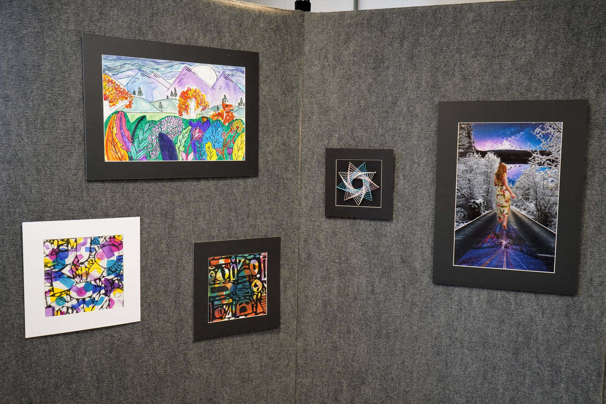 Artwork by Kenai Peninsula Borough School District middle school students is displayed as part of the 33rd Annual Visual Feast at the Kenai Art Center on Wednesday, April 3, 2024. (Jake Dye/Peninsula Clarion)