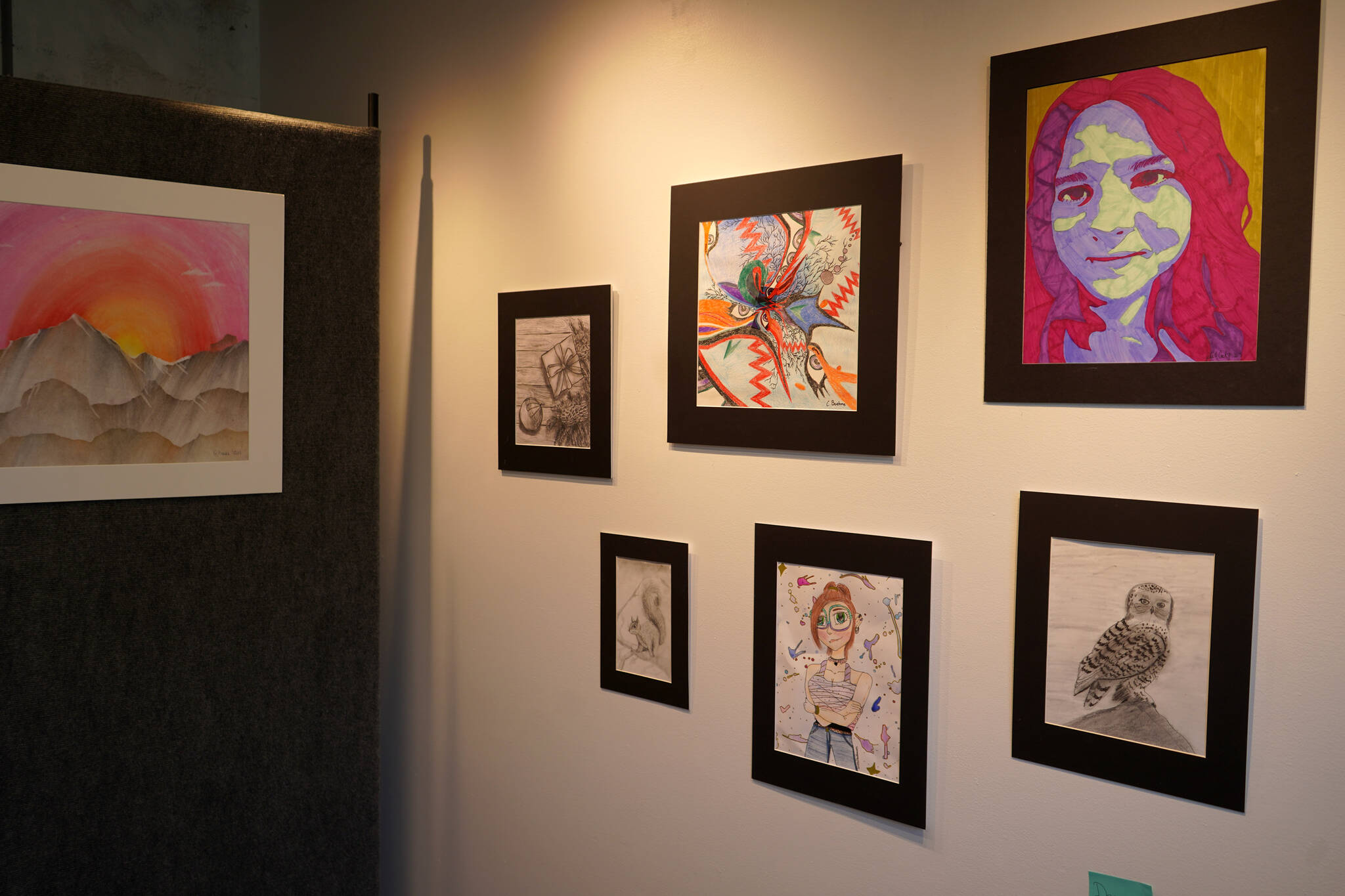 Artwork by Kenai Peninsula Borough School District middle school students is displayed as part of the 33rd Annual Visual Feast at the Kenai Art Center on Wednesday, April 3, 2024. (Jake Dye/Peninsula Clarion)