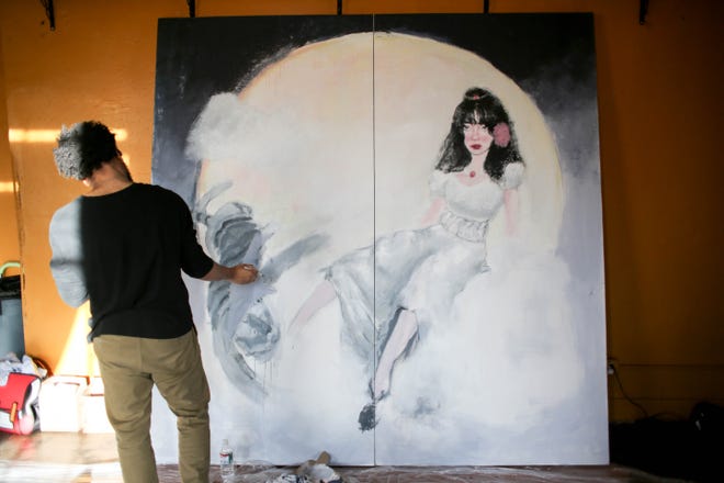 Syon Houston paints his piece "Fortitude" for the Fresh Paint mural project in Oklahoma City, on Monday, March 4, 2024.