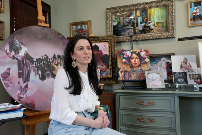 Wall High School art teacher Jill Alexander is shown amongst her work in her home studio Tuesday, April 23, 2024. While participating in an art show in Denver, four of her paintings were stolen.