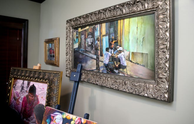 A print of "Domino al Atardecer" hangs in Wall High School art teacher Jill Alexander's home studio Tuesday, April 23, 2024. While participating in an art show in Denver, four of her paintings — including the original of this one — were stolen.