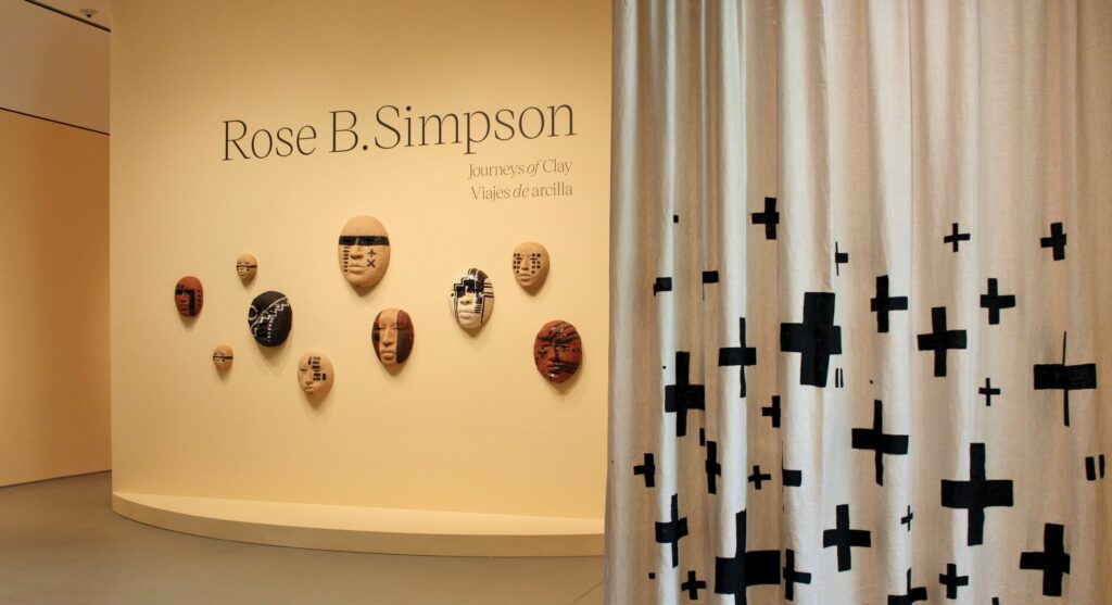A selection of masks greets visitors at the entrance of the exhibition “Rose B. Simpson: Journeys of Clay.” GRETEL SARMIENTO / COURTESY PHOTOS