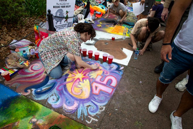 Kathryn Mahan, pays tribute to the 45 year anniversary of the SCAD Sidewalk Arts Festival, on April 27, 2024, in Savannah, GA.