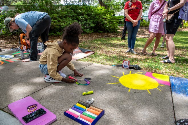Skyler Brown, working on her art at the SCAD Sidewalk Art’s Festival, on April 27, 2024, in Savannah, GA.