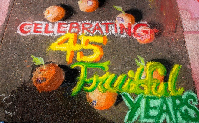 Participants celebrate the 45 fruitful years of the SCAD Sidewalk Arts Festival, on April 27, 2024, in Savannah, GA.