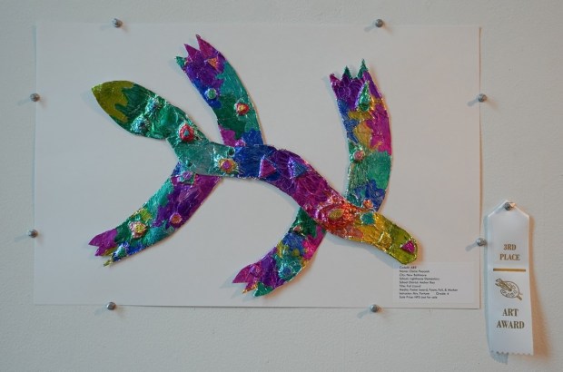 This colorful foil lizard created for a previous show by Claire Peacock is an example of the original works of art that are submitted for this show. Photo courtesy of Anton Art Center