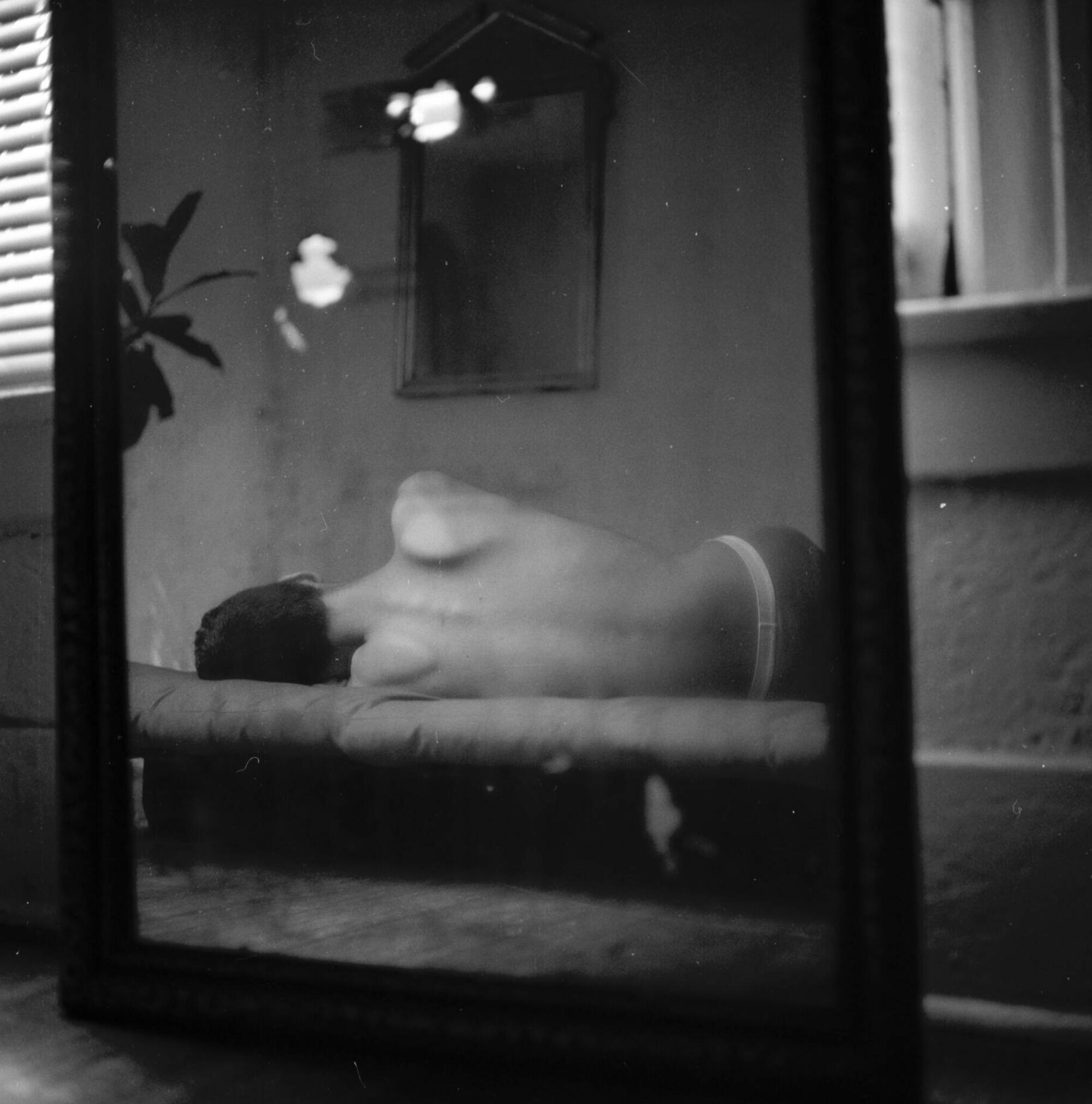 "Bianco, Echo Park — 1992" shows a short-haired person lying on their side, topless, with their back to the camera.