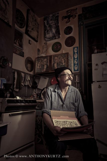 Stencil artist Scott Williams at his home and studio at 20th and Shotwell streets in 2012. Photo courtesy of Anthony Kurtz.