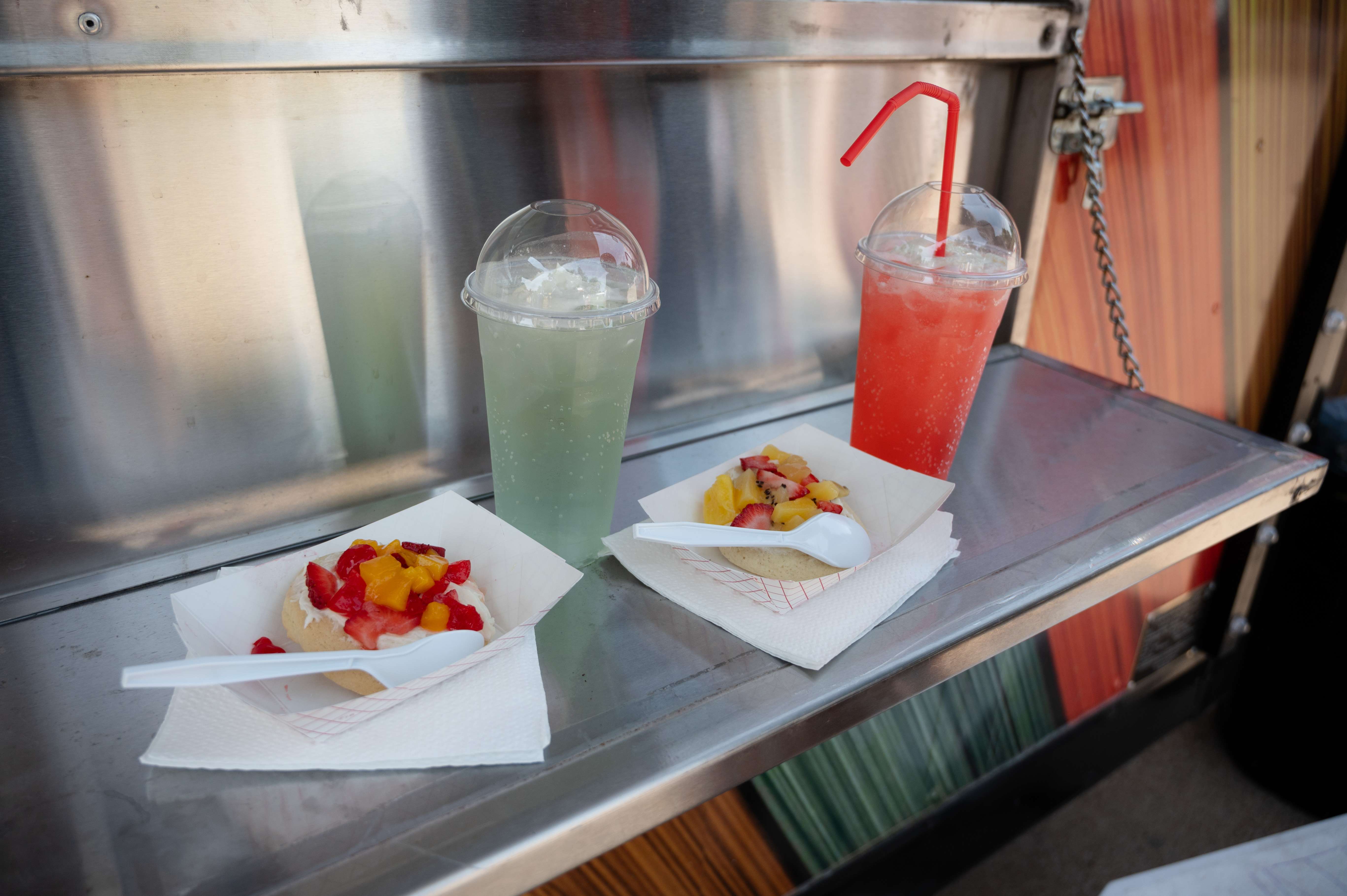 Fruit Pizzas and custom drinks sit ready for customers at Honey & Rue's during the Smoky Hill River Festival on Friday, June 14, at Oakdale Park in Salina. <b>Photo by Olivia Bergmeier</b>