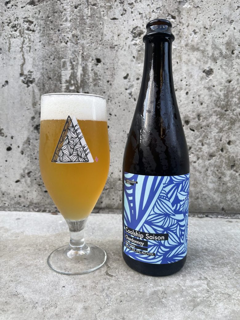 A beer glass and bottle of Chardonnay designed by atiya jones.