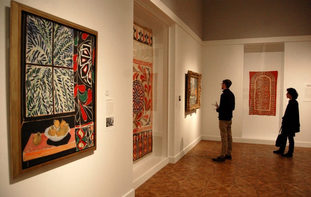 Matisse's 1948 painting "Interior with Egyptian Curtain" (left) is deftly paired with the cotton textile (center) depicted in the right side of the artwork. (Greg Cook)